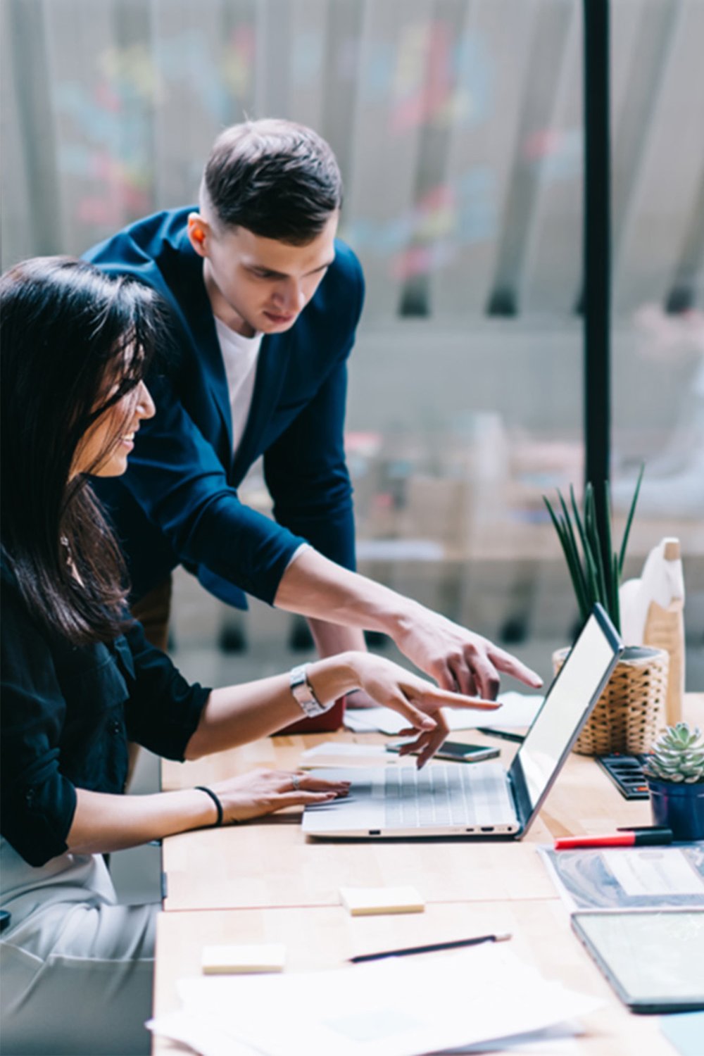 business-colleages-studying-laptop-screen-VERTICAL