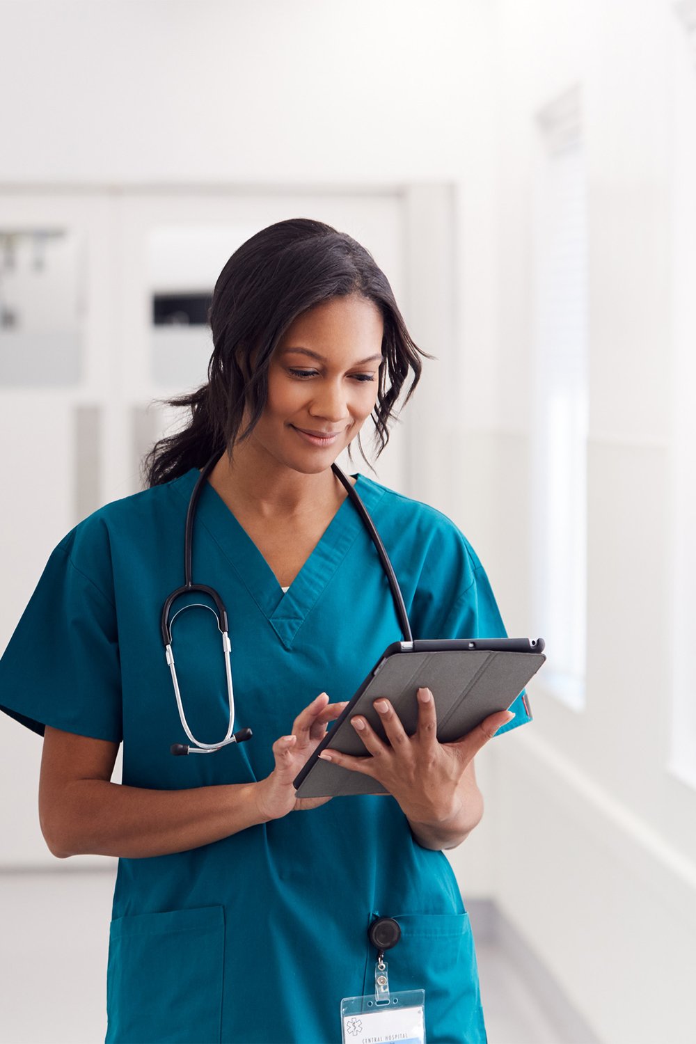 female-doctor-with-ipad-VERTICAL