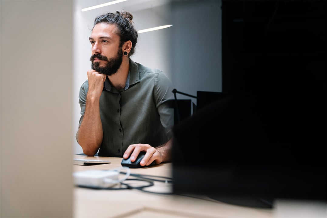 male-analyst-studying-computer-monitor