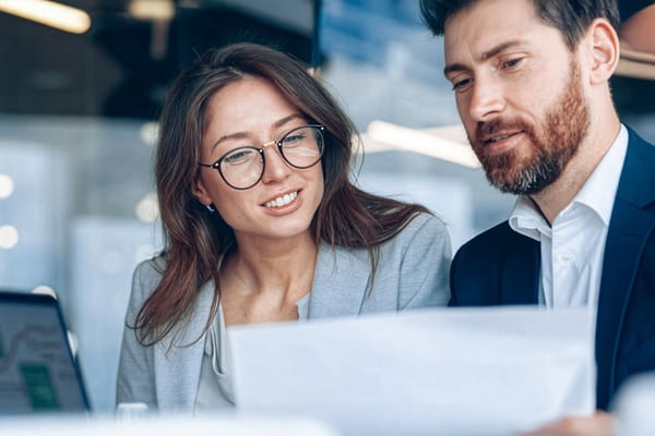 male-and-female-business-professionals-sharing-insights