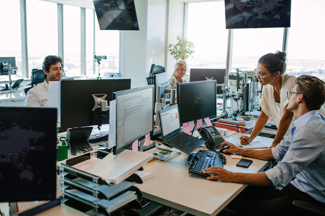 project-managers-collaborating-in-high-rise-office