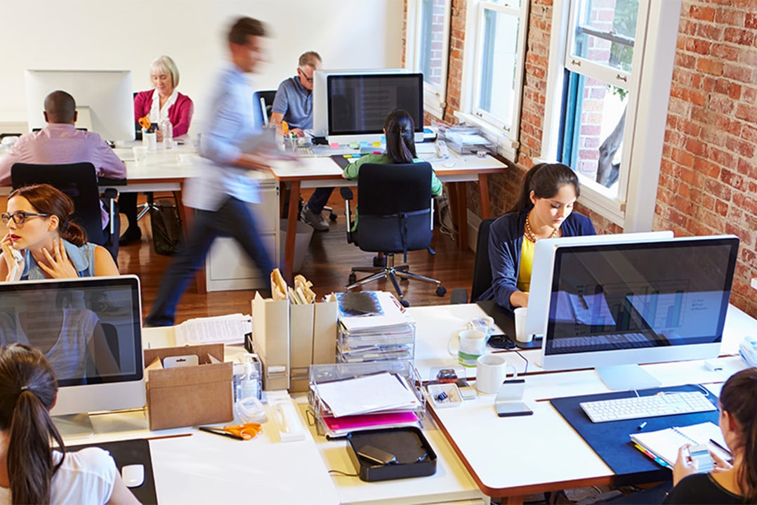 team-working-in-busy-open-floor-office-CASCADING
